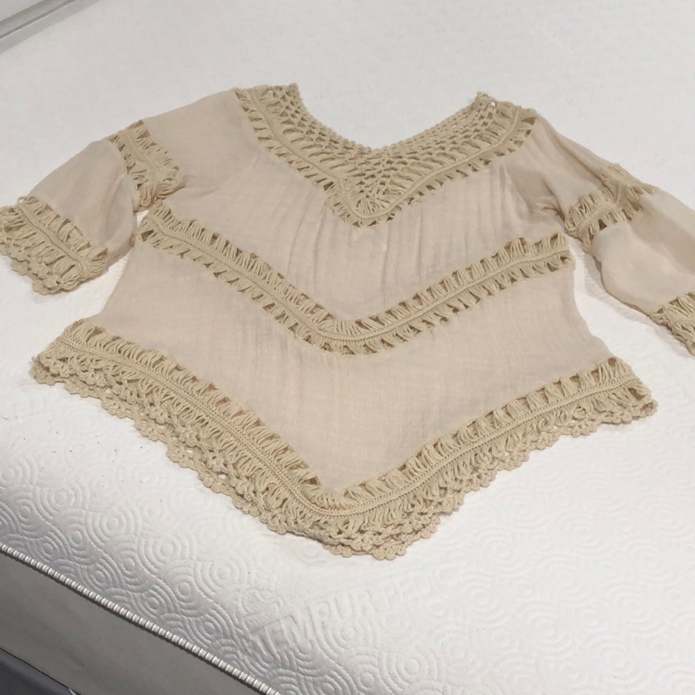 XL top, purchased at a boutique. Only worn once.